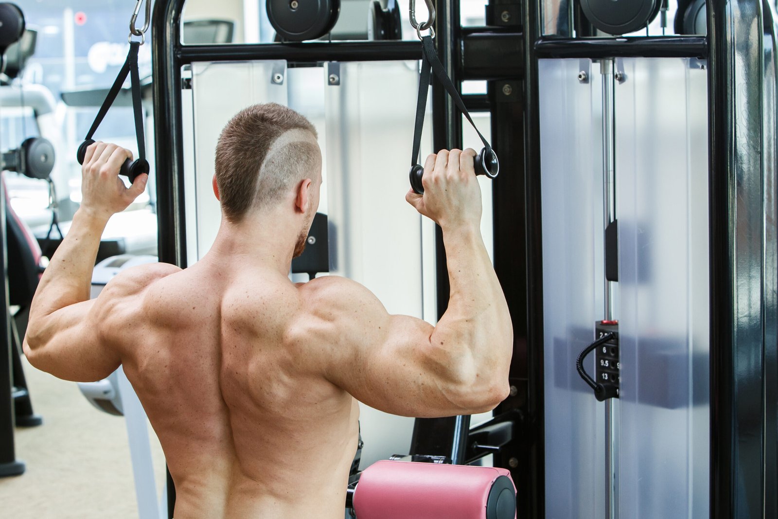 Gym. Handsome man during workout